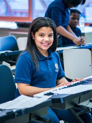 student at keyboard 